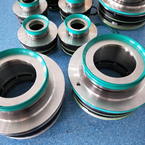 Seal assemblies with green sealing rings